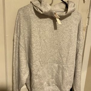 BRAND NEW NEVER WORN PINK SWEATSHIRT